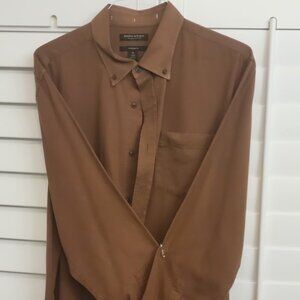 Men's size XL burnt orange/brown long sleeve button down flannel shirt.